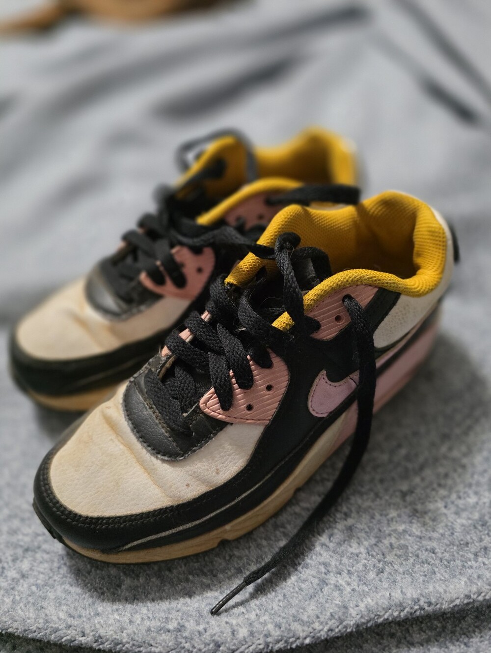 Kids Nike Black and Pink Athletic Sneakers with Yellow Lining